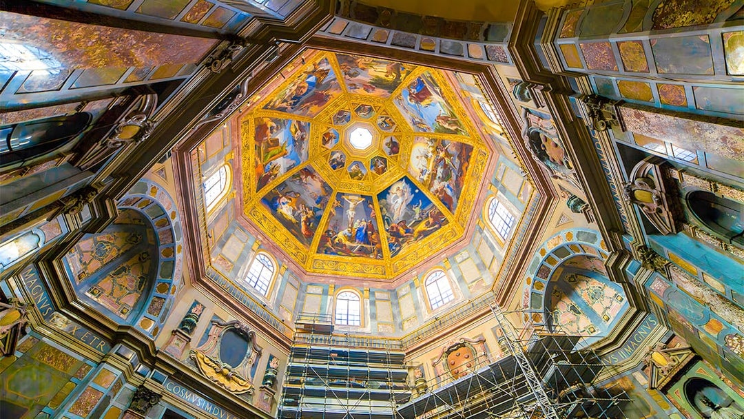 Interior view of Medici Chapel's ornate ceiling with frescoes, Florence, Italy.