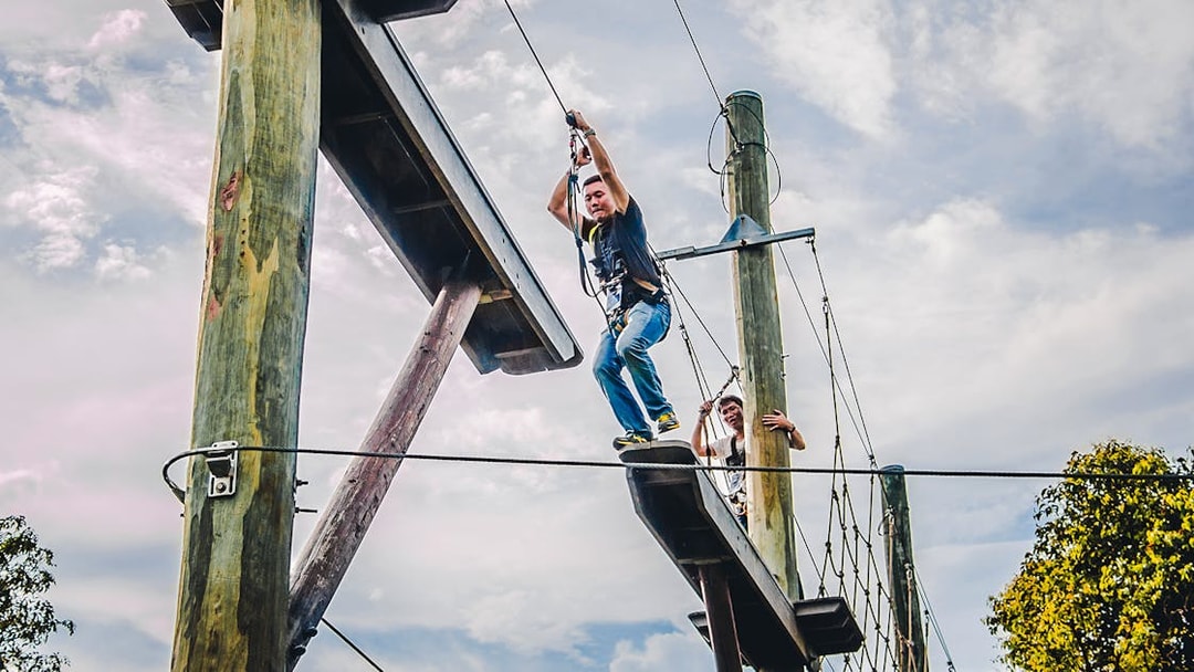Ziplining adventure at Mega Adventure Park, Singapore with participants on the course.