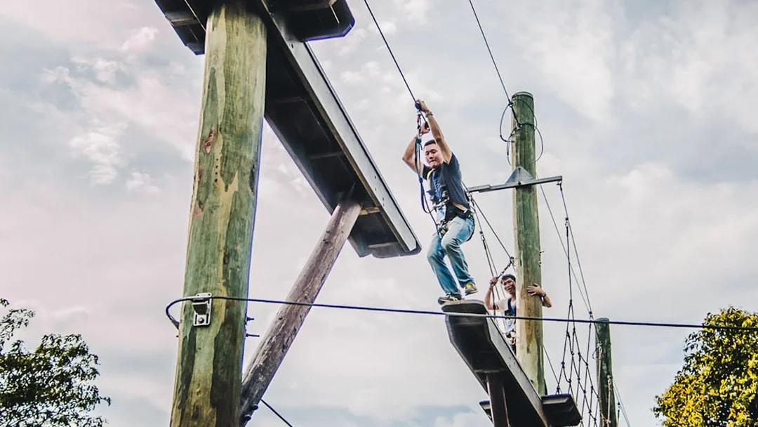 Person ziplining at Mega Adventure Park, Singapore.