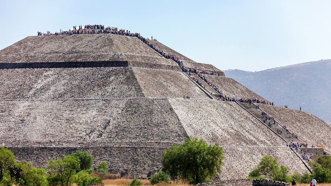 People climbing the Pyramid of the Sun in Teotihuacan, Mexico.