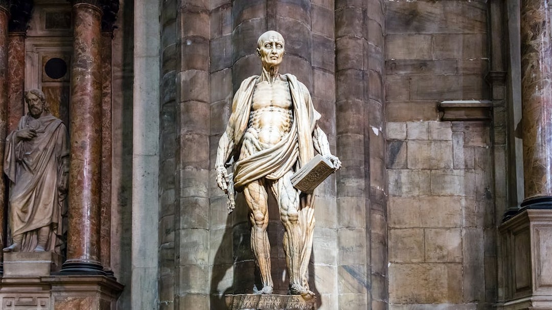 Intricate statue of Saint Bartholomew at Duomo Cathedral, Milan.