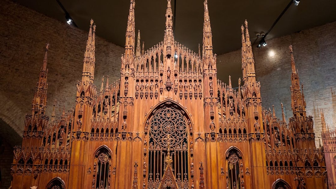 Wooden model of Milan Duomo at the museum, showcasing intricate architectural details.