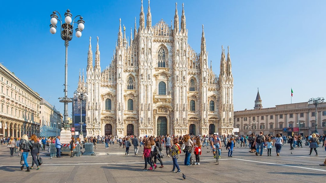 Crowd in front of the Duomo di Milano in Milan, Italy.