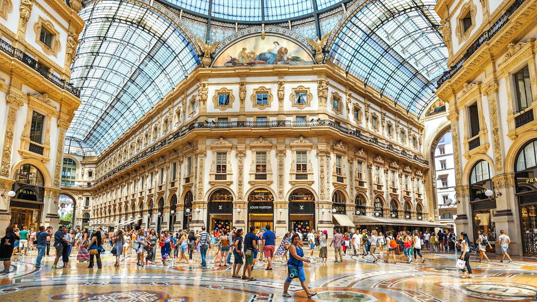 Galleria Vittorio Emanuele II interior with visitors, Milan Self Guided Audio Tour.
