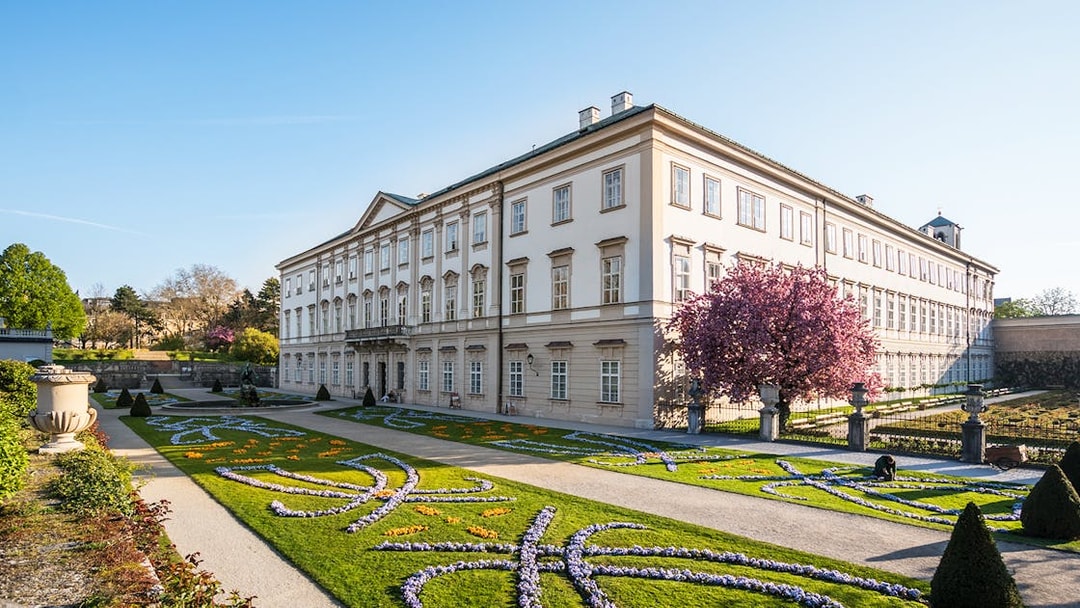 Mirabell Palace gardens with blooming flowers, Salzburg, Austria.
