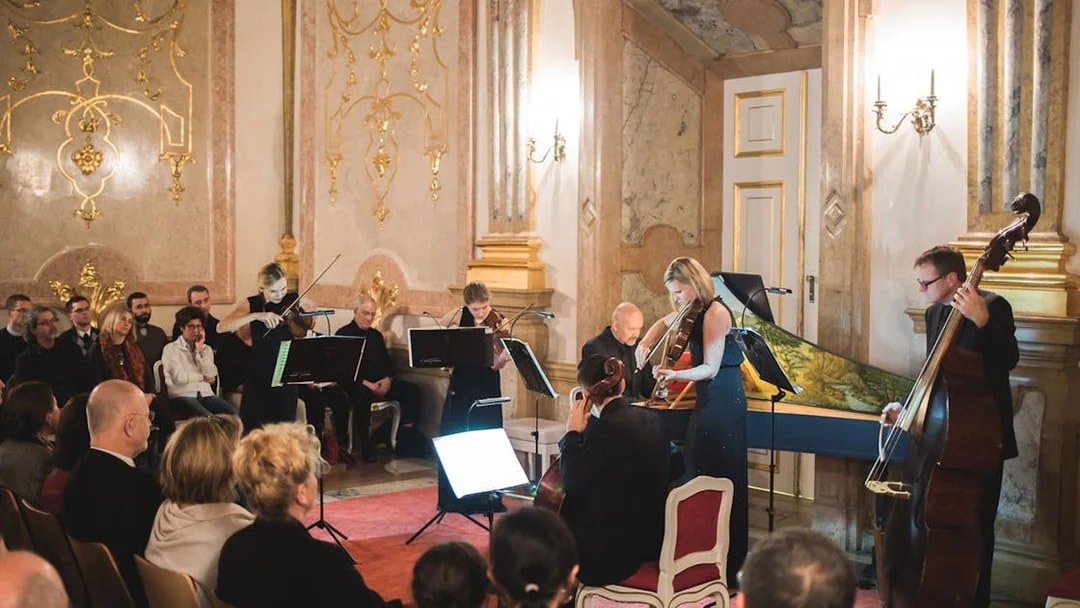 Musicians performing classical music at Mirabell Palace concert hall, Salzburg.