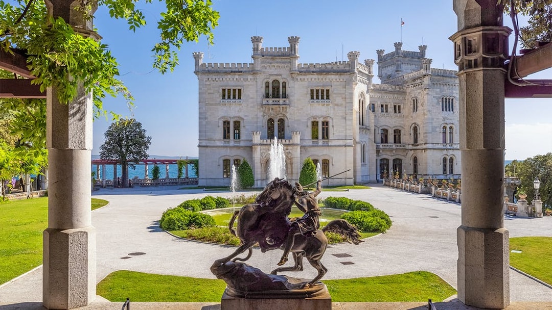 Miramare Castle courtyard with warrior statue in Trieste, Italy.
