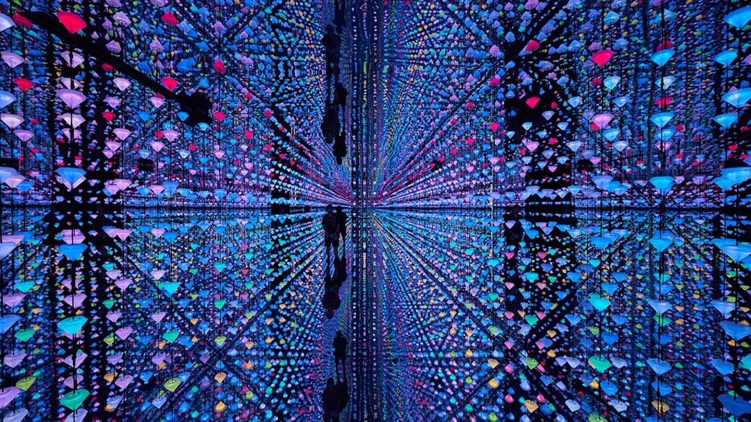 Colorful light installation with reflections at Moco Amsterdam.