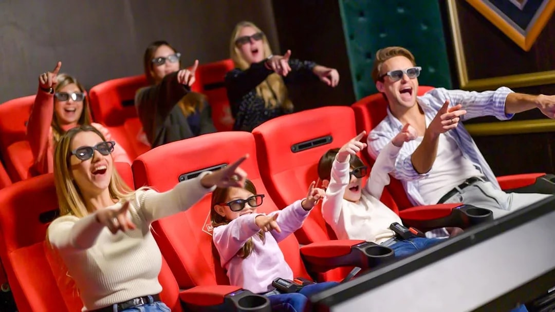 Visitors enjoying a 4D cinema experience at Monopoly Dreams Melbourne.
