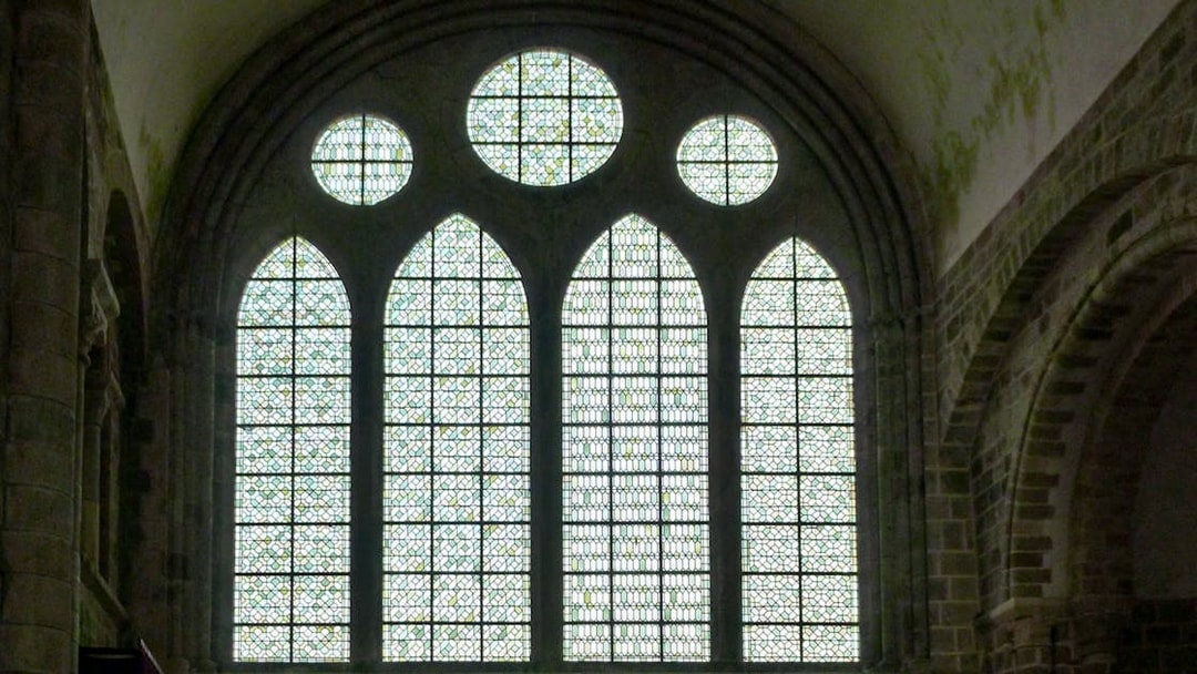 Stained glass windows inside Mont-Saint-Michel Abbey, France.