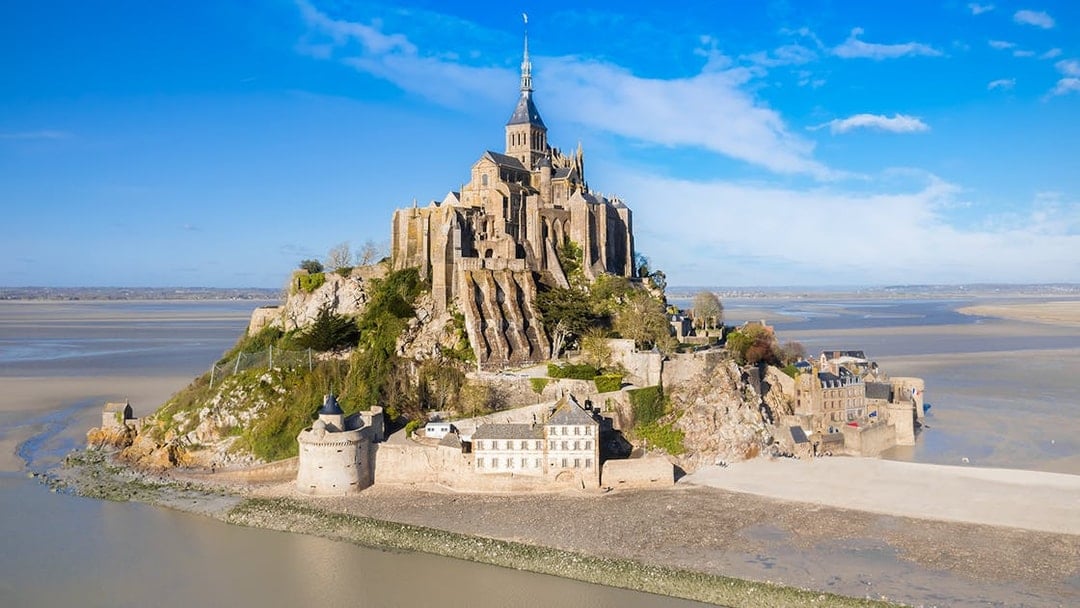 Mont Saint-Michel abbey on tidal island in Normandy, France.