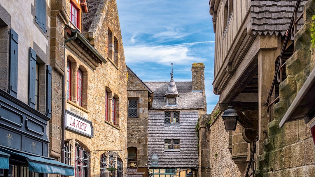 Stone buildings and shops on Mont Saint Michel walking tour.