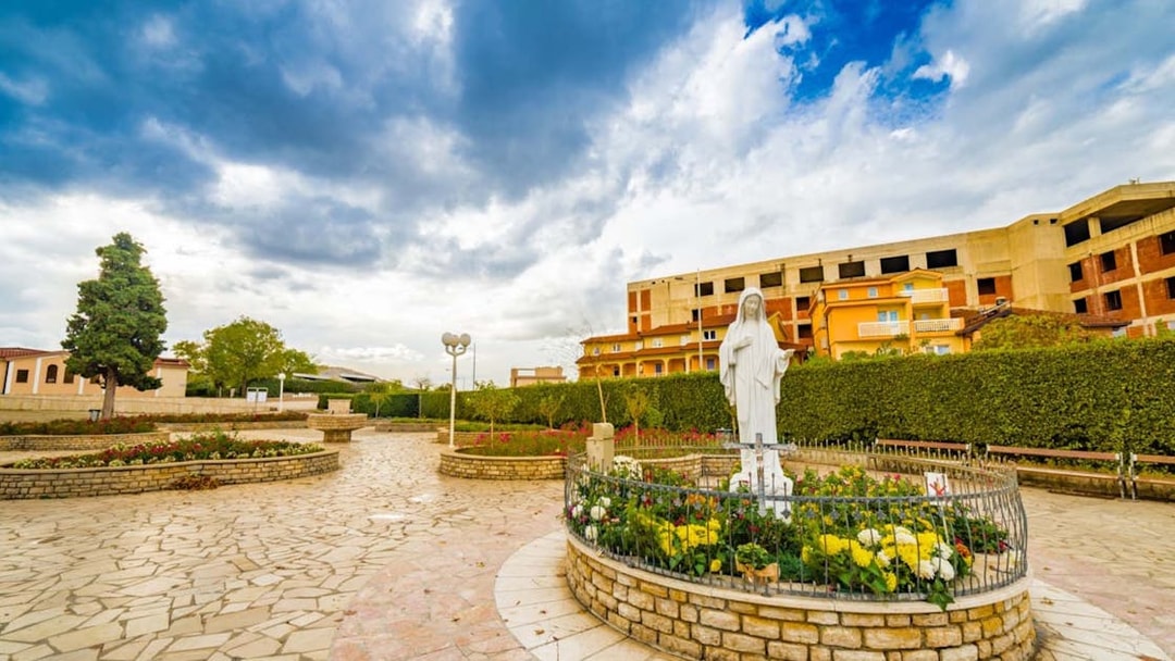 Statue of Virgin Mary in Medjugorje garden, Bosnia and Herzegovina, on Mostar & Medjugorje Day Trip.