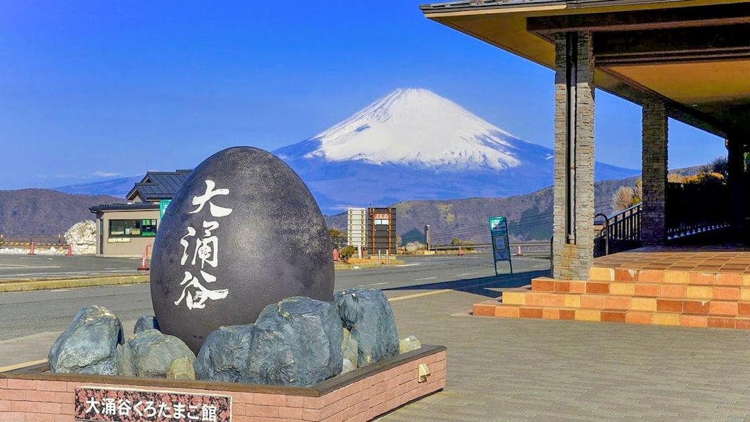 Owakudani black egg monument with Mount Fuji in the background, Hakone, Japan.