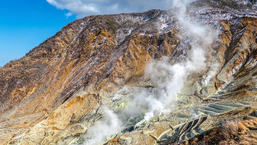 Volcanic steam vents at Owakudani Valley on Mt Fuji tour from Tokyo.