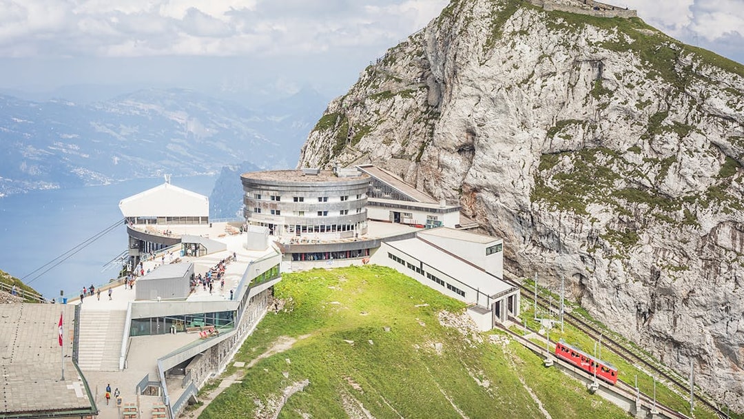 Mount Pilatus with cogwheel train and Lucerne lake view, Switzerland.