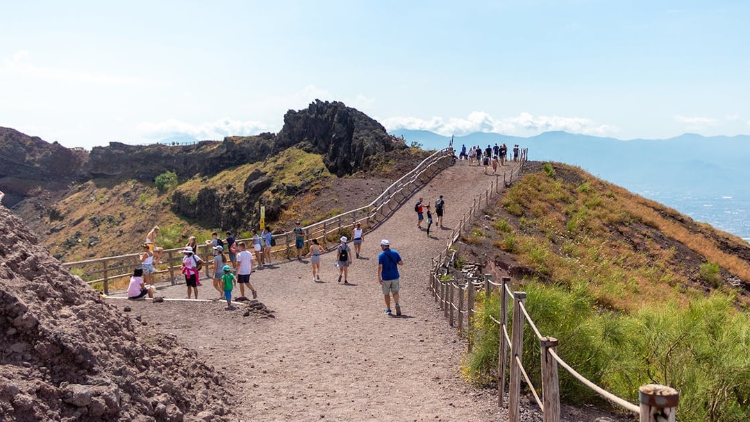 Visitors walking along the path on Mount Vesuvius, Italy.