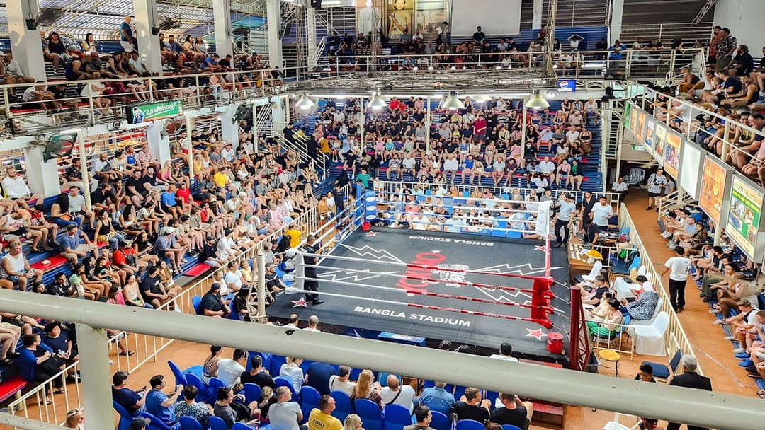 Crowd watching a Muay Thai match at Bangla Boxing Stadium in Phuket.