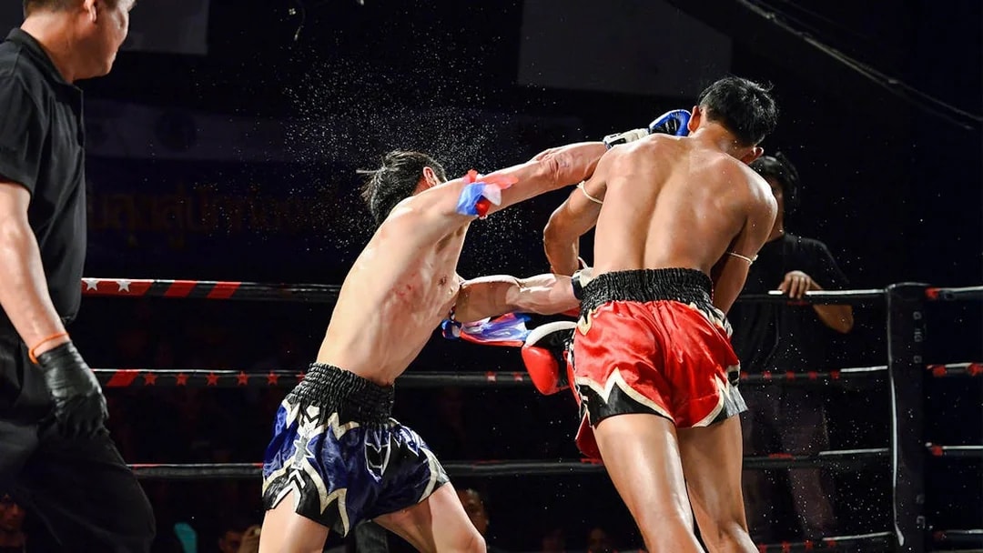 Muay Thai fighters in action at Bangla Boxing Stadium, Phuket.