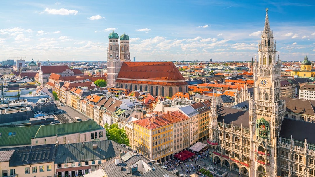 Munich skyline featuring Marienplatz town hall and Frauenkirche in the background.