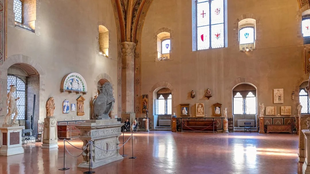 Interior of Museo del Bargello in Florence, showcasing sculptures and Renaissance art.