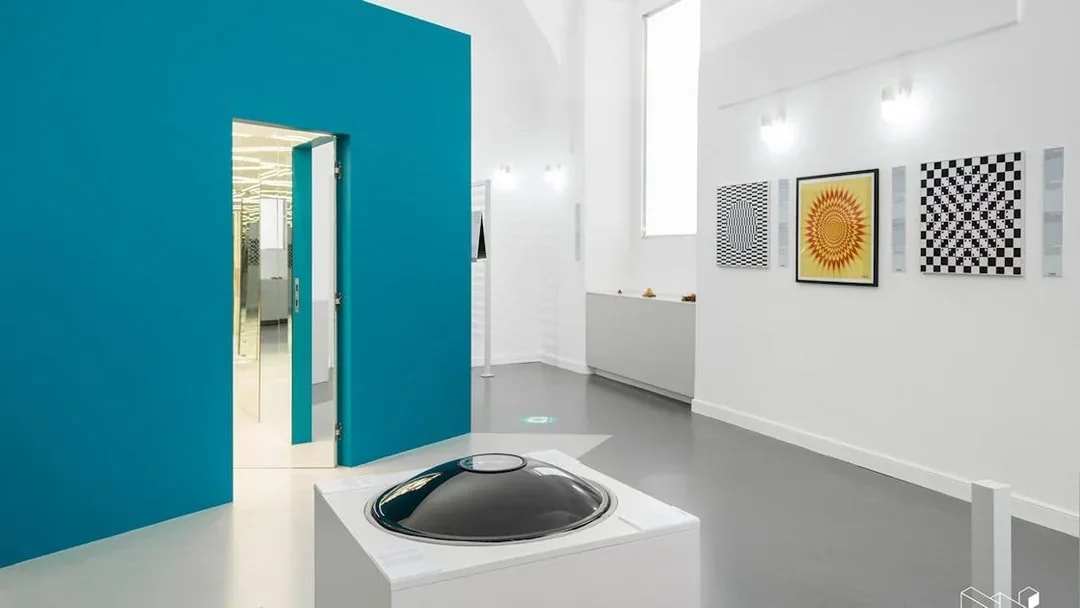 Exhibits at the Museum of Illusions in Vienna, Austria, featuring optical art and interactive displays.