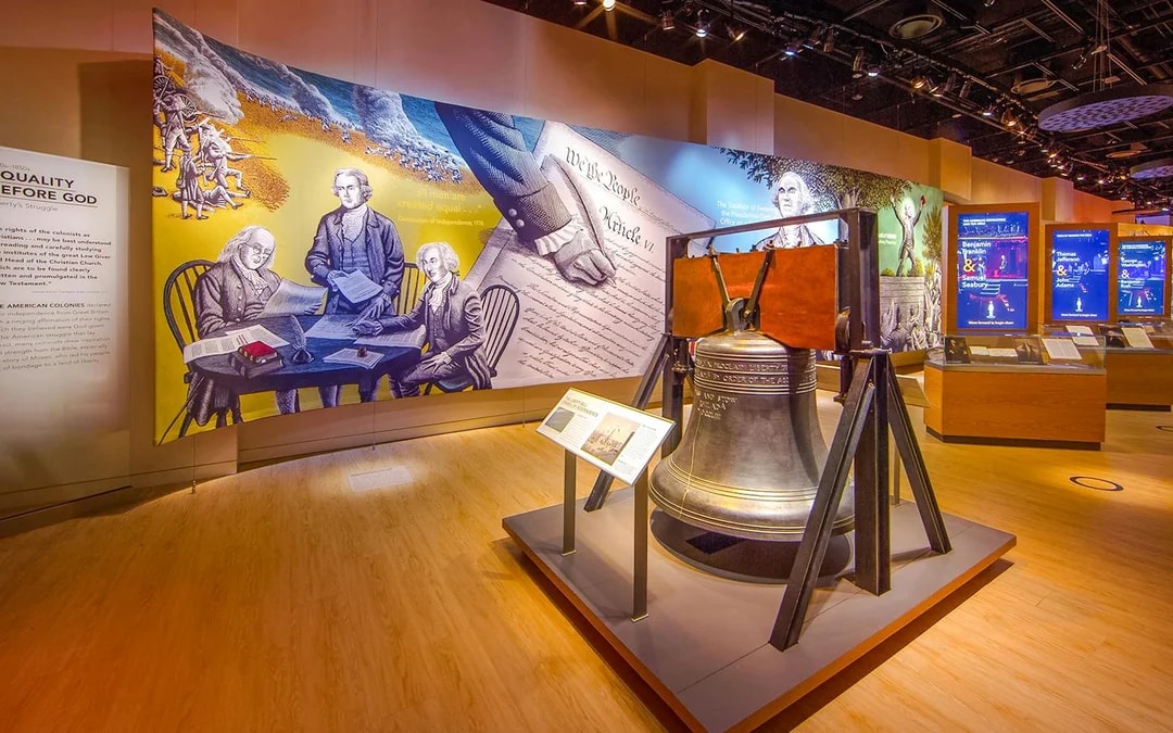 Exhibit featuring historical documents and Liberty Bell replica at Museum of the Bible, Washington DC.