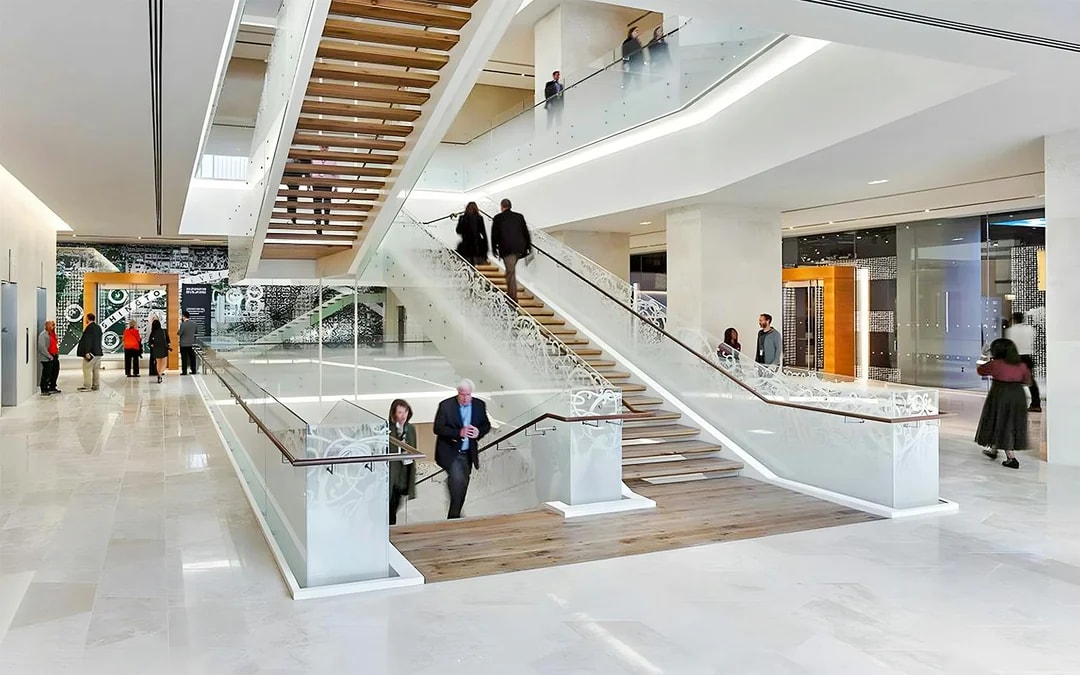 Visitors exploring the modern interior of the Museum of the Bible in Washington, D.C.