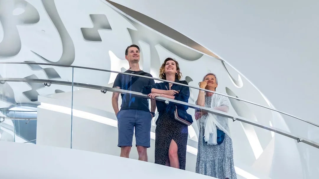 Visitors on a balcony at Museum of the Future, Dubai.