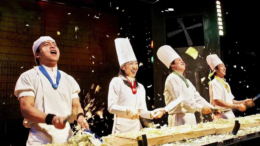 Chefs performing on stage at Seoul Myeongdong Nanta Musical Show.