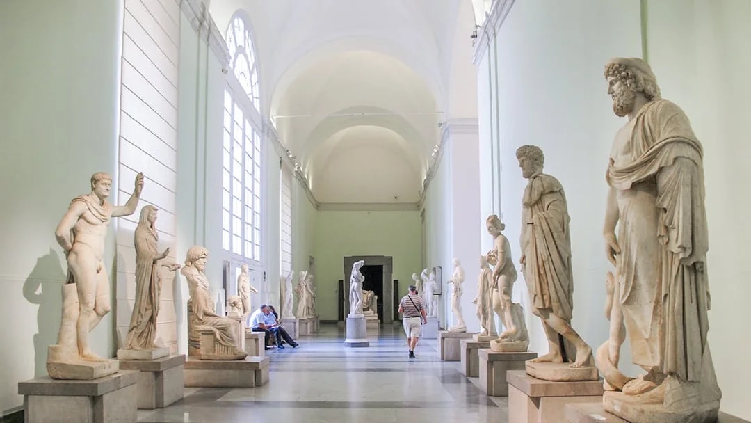 Statues in a gallery at the National Archaeological Museum, Naples.
