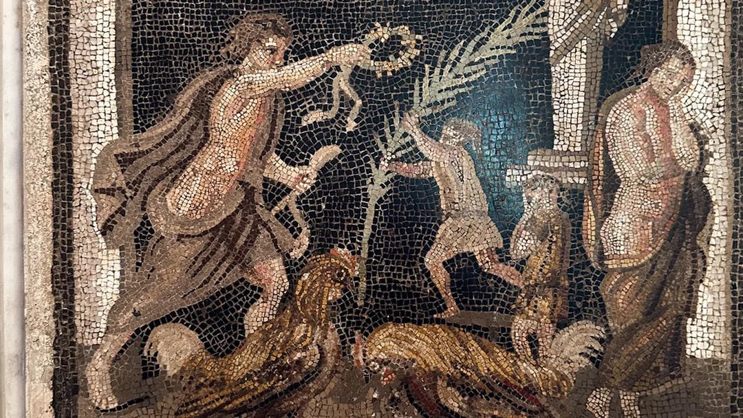 Ancient mosaic depicting figures and roosters at Naples National Archaeological Museum.