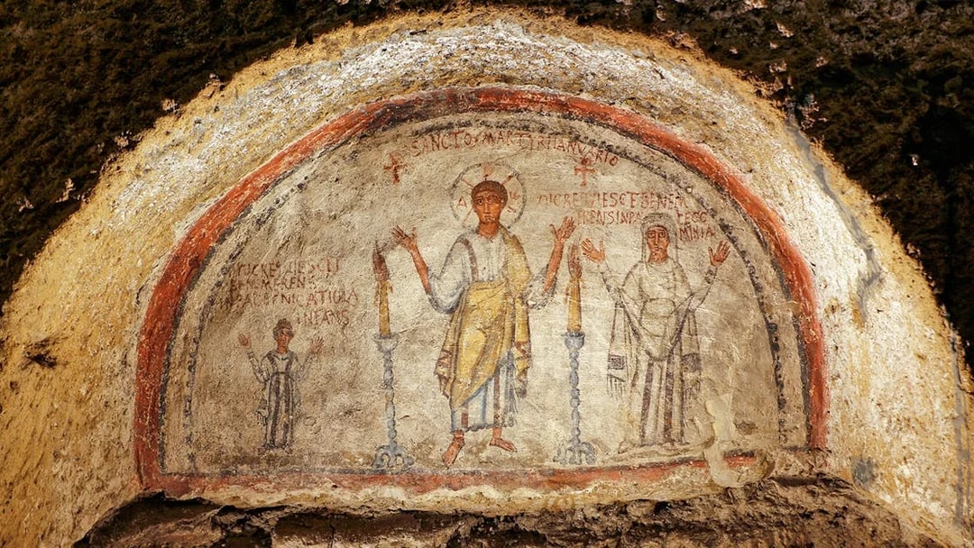 Ancient frescos at Catacombs of San Gennaro in Naples on a guided tour.