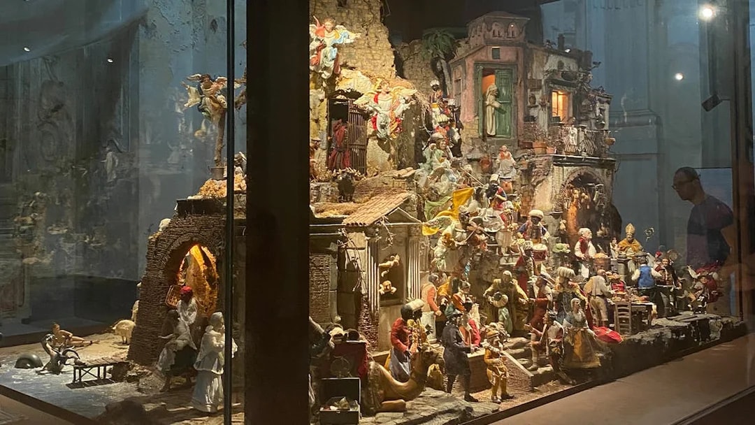 Nativity scene display in the Catacombs of San Gaudioso, Naples, featuring detailed figurines.
