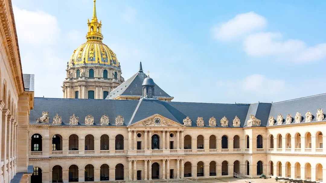 Courtyard of Les Invalides with view of the golden dome, Paris, France.