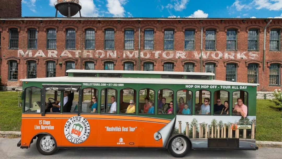 Nashville hop-on hop-off trolley in front of Marathon Motor Works building.