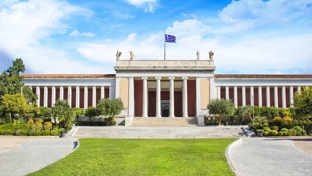 National Archaeological Museum facade with neoclassical columns in Athens, Greece.