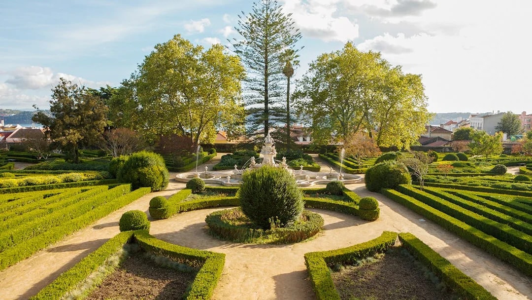 Formal garden with fountain at National Palace of Ajuda, Lisbon.