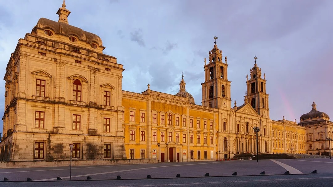 National Palace of Mafra facade at sunset, Portugal.