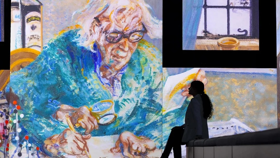 Frameless National Portrait Gallery exhibit featuring a large colorful painting of an elderly person writing.