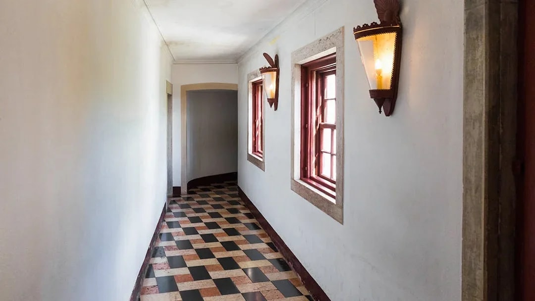 Hallway inside National Sintra Palace with Portuguese ceramic tiles.