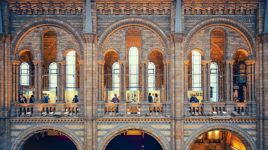 Visitors exploring exhibits at the Natural History Museum, London.