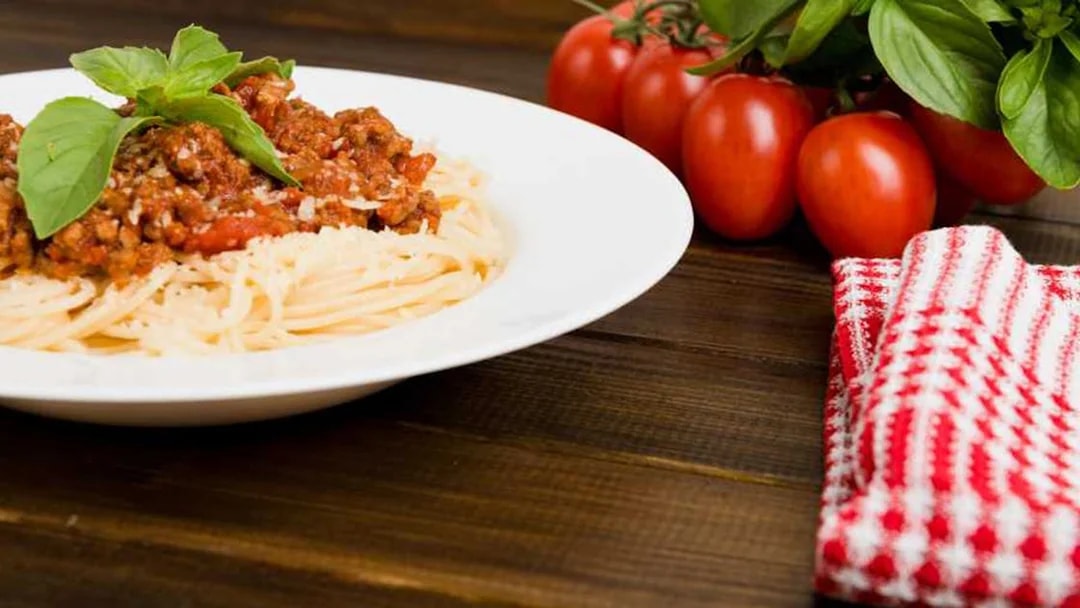 Spaghetti with tomato sauce and basil at Neapolitan cooking school in Sorrento.