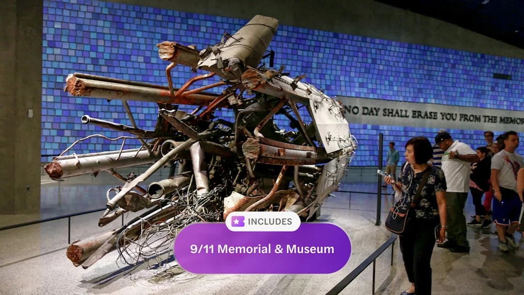 Wreckage display at 9/11 Memorial and Museum with visitors observing.