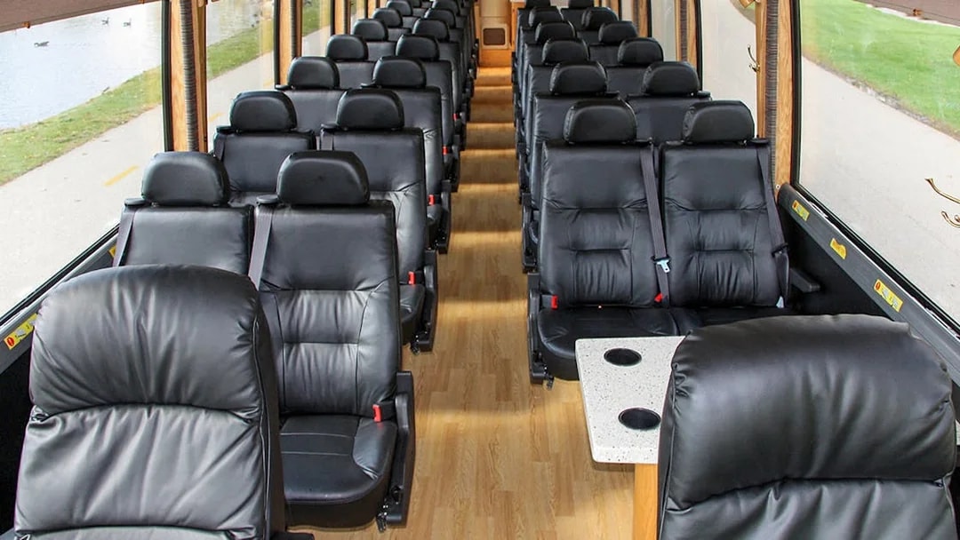 Luxury bus interior with leather seats for Couch USA route from Newark Airport to Manhattan.