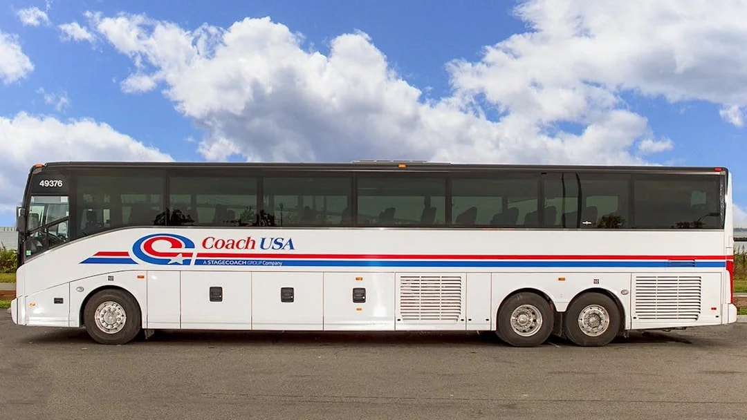 Coach USA bus for Newark Airport to Manhattan route.