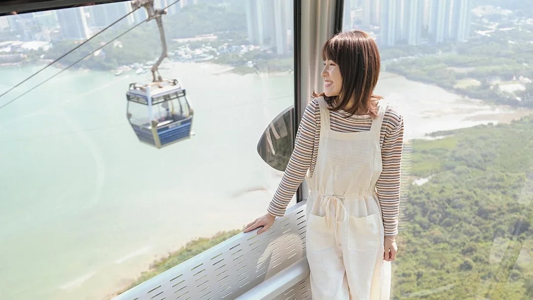 Nong Ping Crystal Plus Cabin with scenic view of Hong Kong landscape.