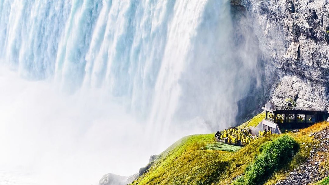 Horseshoe Falls at Niagara with visitors at Journey Behind the Falls, Canada.