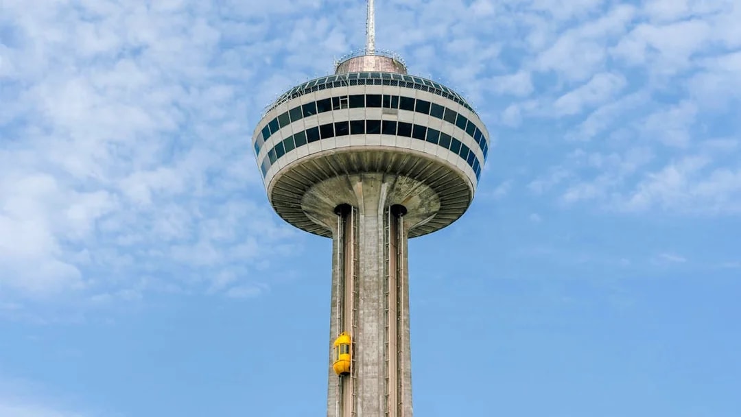 Skylon Tower with observation deck and yellow elevator in Niagara Falls, Ontario.