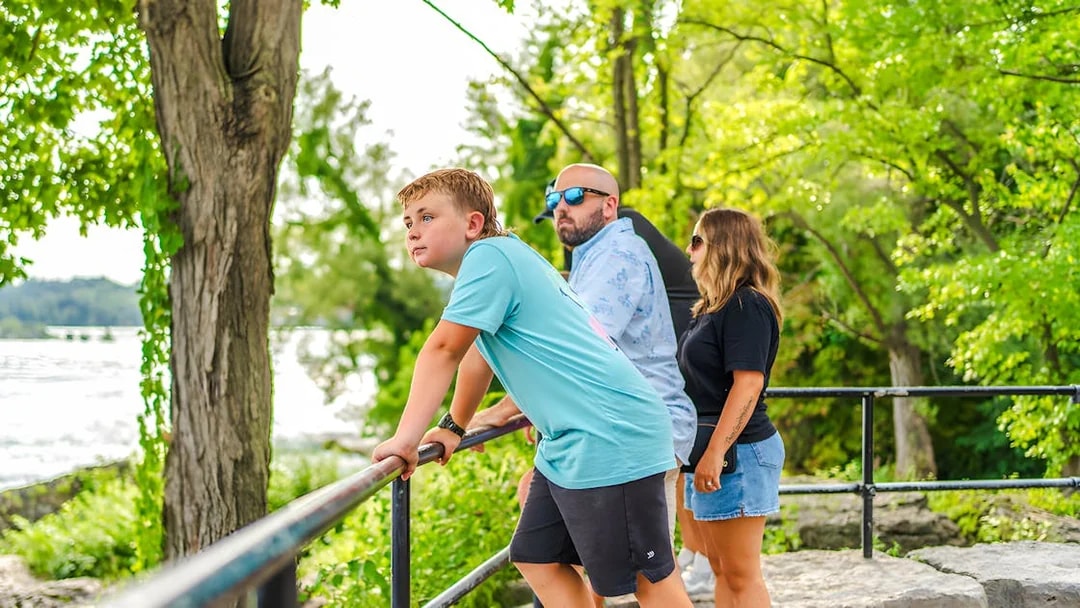 Family enjoying the view at Niagara Falls lookout.